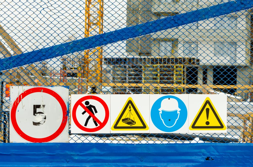 warning signs fence near construction site